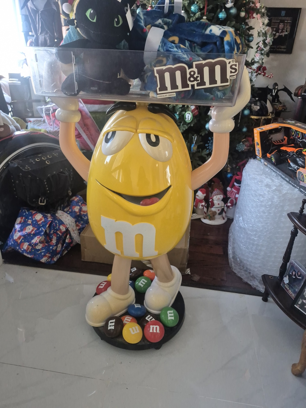M&M'S Yellow Candy Character Stand with Multi-Colored M&M Base